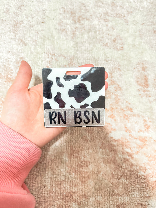 Cow print badge tag